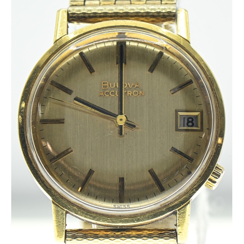 43 - Bulova Accutron 18ct gold cased gents watch, the gold coloured dial with raised baton markers, centr... 