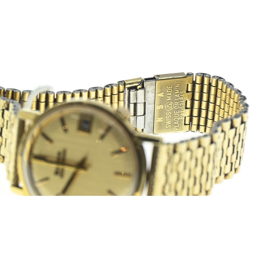 43 - Bulova Accutron 18ct gold cased gents watch, the gold coloured dial with raised baton markers, centr... 