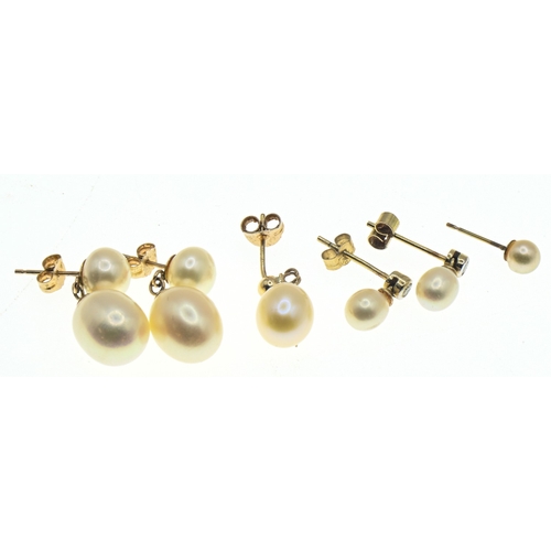 50 - Two pairs of pearl earrings and two single pearl earrings, one pair 9ct gold hallmarked and set with... 