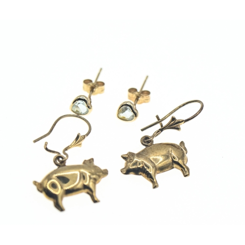 56 - Two pairs of yellow metal earrings, each marked '375', including pair of gem-set heart-shaped studs ... 