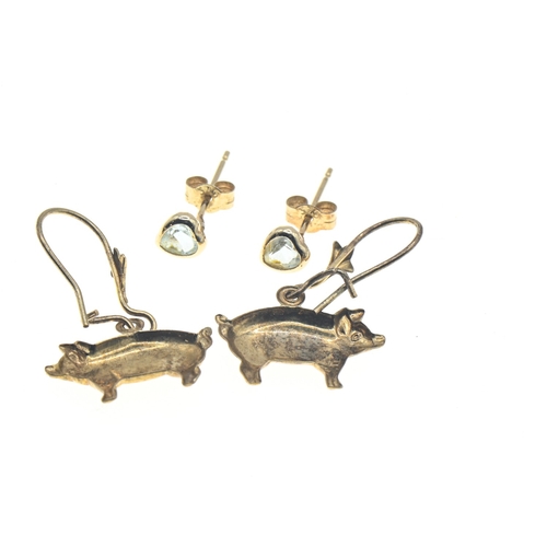 56 - Two pairs of yellow metal earrings, each marked '375', including pair of gem-set heart-shaped studs ... 