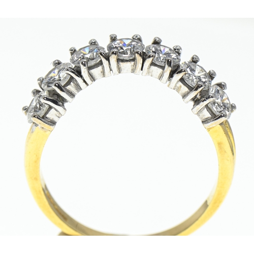 74 - 18ct gold and seven diamond ring, hallmarked, the diamonds together estimated to weigh 1.68 carats, ... 