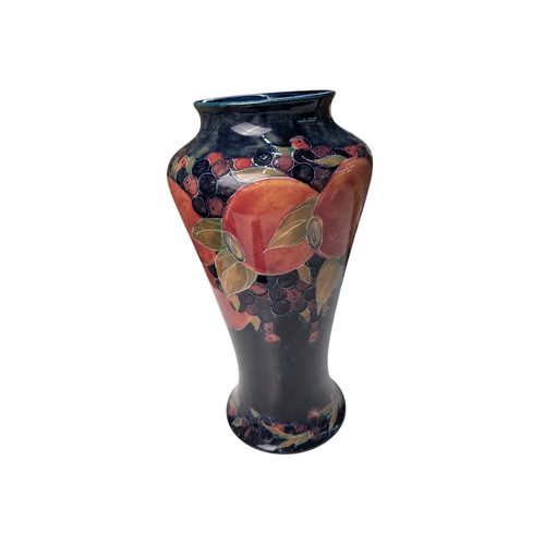 484 - Moorcroft Pottery large pomegranate vase, stamped and signed to base, dated 1919, ht. 39cm