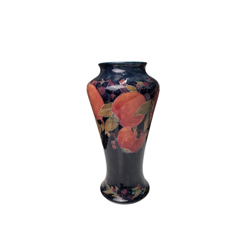 484 - Moorcroft Pottery large pomegranate vase, stamped and signed to base, dated 1919, ht. 39cm