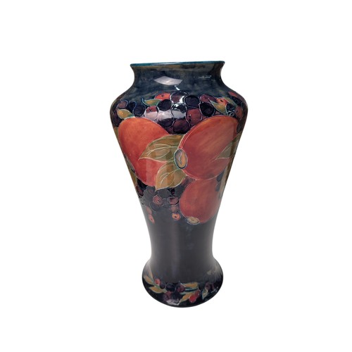 484 - Moorcroft Pottery large pomegranate vase, stamped and signed to base, dated 1919, ht. 39cm