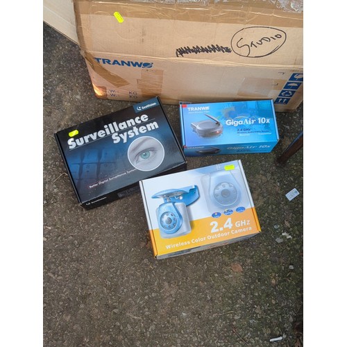624 - A group of boxed security and wireless video equipment, including a Geovision surveillance system, a... 