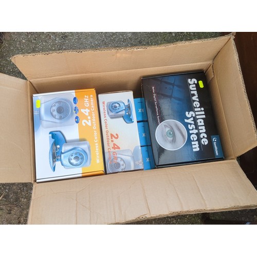 624 - A group of boxed security and wireless video equipment, including a Geovision surveillance system, a... 