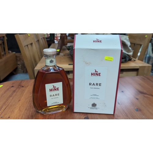 Hine ‘Rare — The Original’ Cognac Fine Champagne, 70cl, 40% vol, in a moulded glass decanter with branded stopper, together with the original presentation box printed with tasting notes and Maison fondée en 1763 emblem.