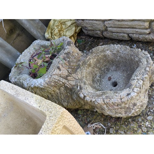 20 - Two concrete garden planters: one square trough with pebbled ground and relief oak-leaf cartouche; t... 