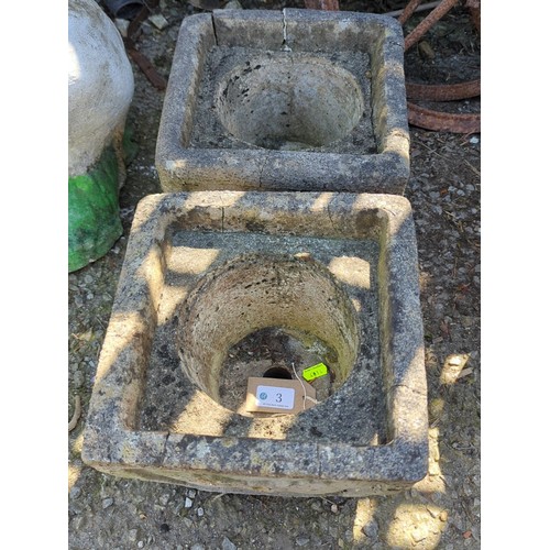 3 - A pair of concrete square garden planters, each with a circular recessed well and moulded panel deco... 