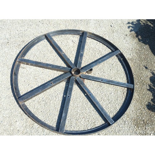 32A - Industrial steel wheel frame of circular rimmed form with eight radiating box-section spokes, drille... 