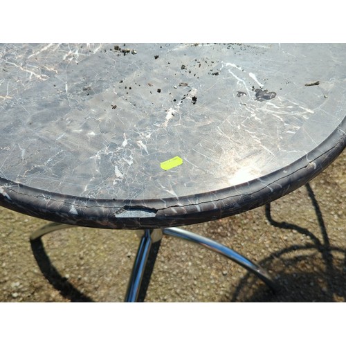 40 - Contemporary bistro table with circular grey marble-effect top, the rimmed edge above a polished chr... 