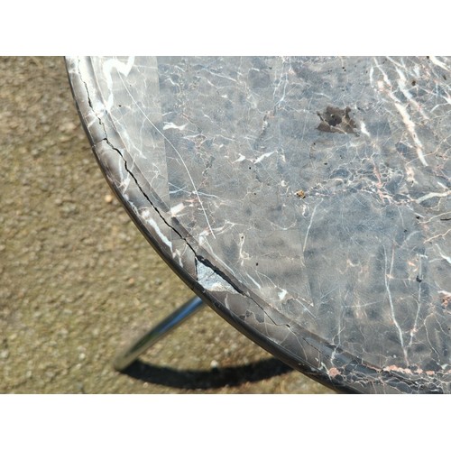 40 - Contemporary bistro table with circular grey marble-effect top, the rimmed edge above a polished chr... 