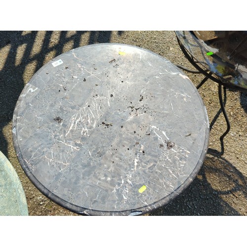 40 - Contemporary bistro table with circular grey marble-effect top, the rimmed edge above a polished chr... 