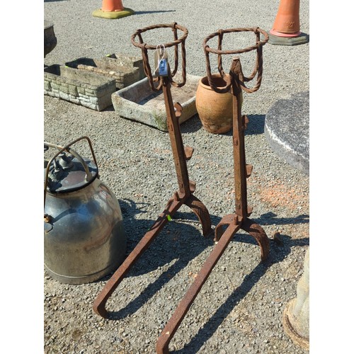 48 - A pair of wrought-iron fire dogs.