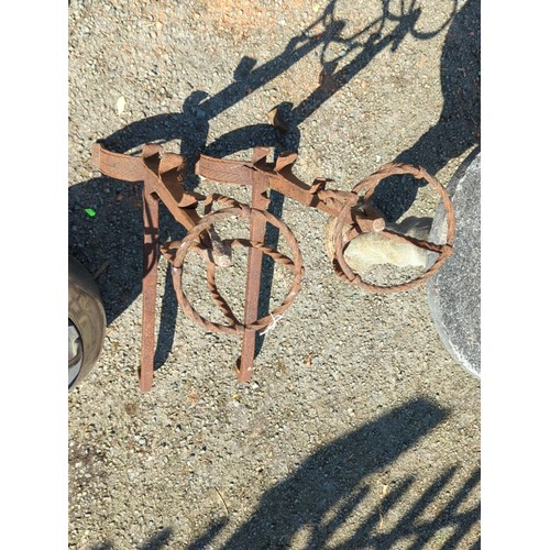 48 - A pair of wrought-iron fire dogs.