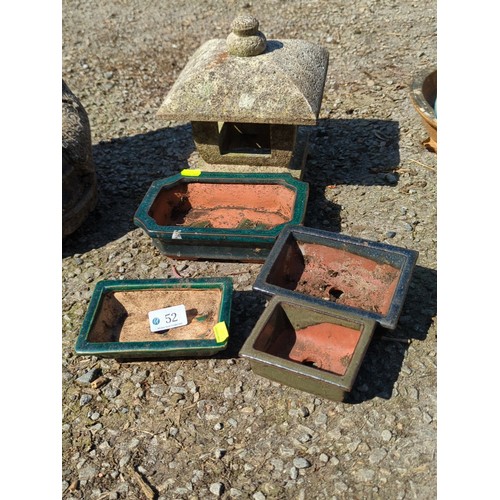 52 - A group of glazed stoneware bonsai planters of rectangular and square form, in green and dark glazes... 