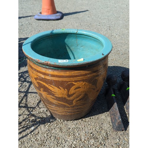 65 - Large Chinese earthenware jardinière of tapering cylindrical form, the turquoise-glazed interior wit... 