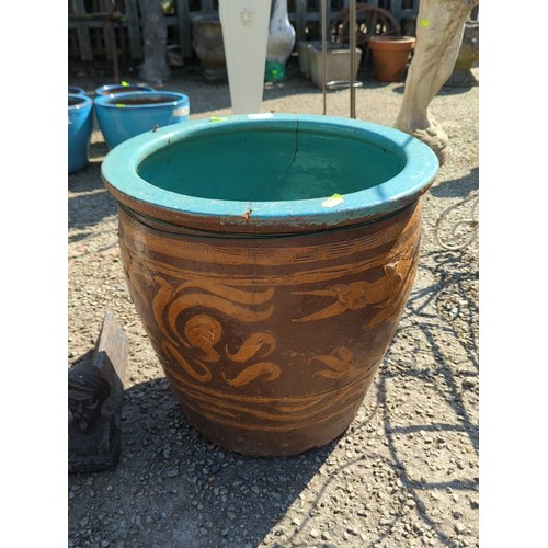65 - Large Chinese earthenware jardinière of tapering cylindrical form, the turquoise-glazed interior wit... 
