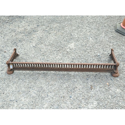 69 - Victorian cast-iron fire curb or fender, of rectangular form with arched piercings and reeded rails,... 