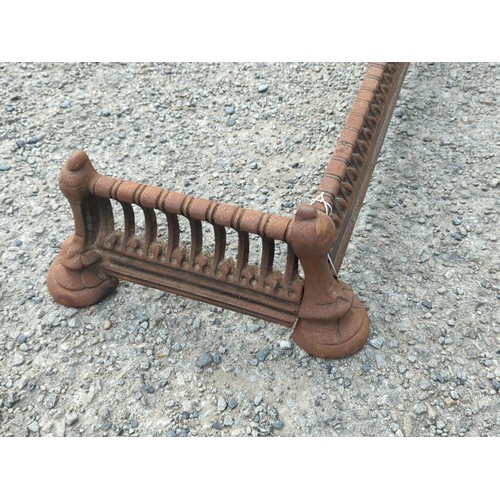 69 - Victorian cast-iron fire curb or fender, of rectangular form with arched piercings and reeded rails,... 