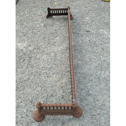 69 - Victorian cast-iron fire curb or fender, of rectangular form with arched piercings and reeded rails,... 