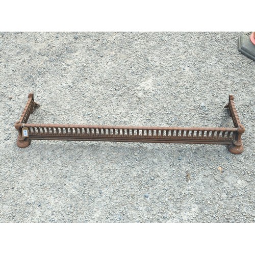 69 - Victorian cast-iron fire curb or fender, of rectangular form with arched piercings and reeded rails,... 