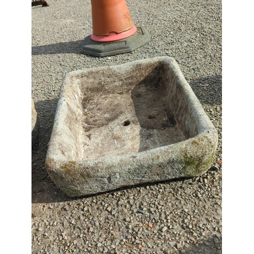 72 - Concrete trough or basin of rectangular form with rounded corners, the interior with a stepped platf... 