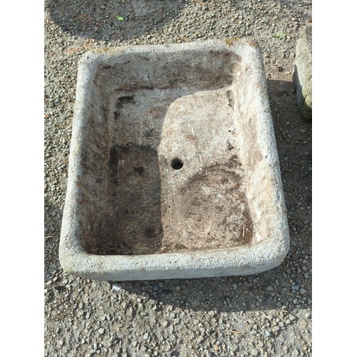 72 - Concrete trough or basin of rectangular form with rounded corners, the interior with a stepped platf... 