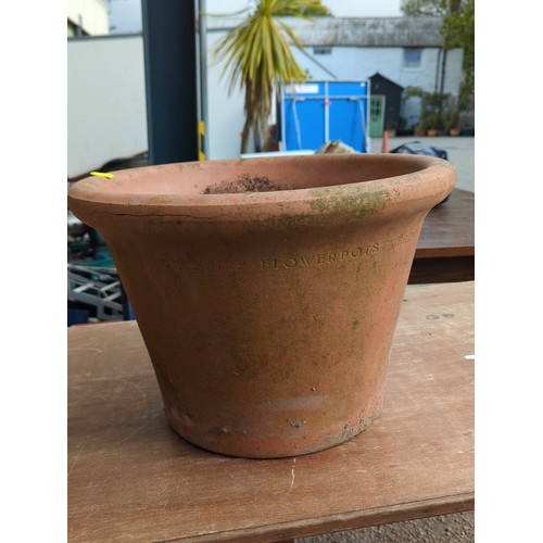 78 - Large terracotta garden flowerpot of tapering cylindrical form with broad rolled rim and drainage ho... 