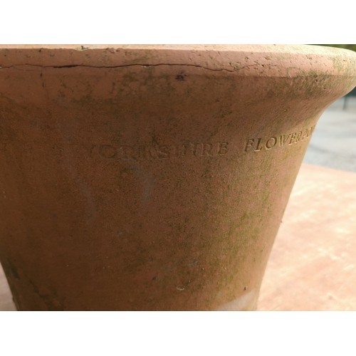78 - Large terracotta garden flowerpot of tapering cylindrical form with broad rolled rim and drainage ho... 