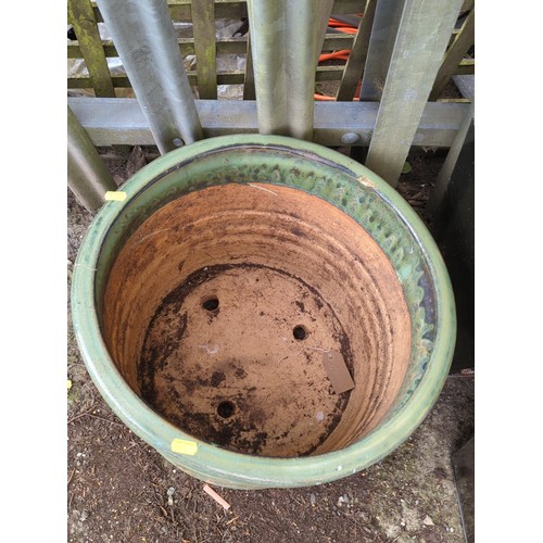 79 - Large glazed stoneware jardinière of cylindrical form with everted rim and moulded horizontal bands... 