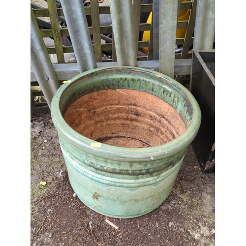 79 - Large glazed stoneware jardinière of cylindrical form with everted rim and moulded horizontal bands... 