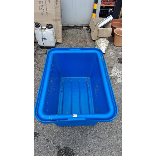 107 - Large moulded blue plastic storage tub.