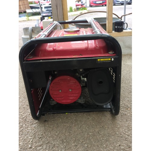 119 - Portable petrol generator by German Stahl, model MT8500, in red and black tubular steel frame; contr... 