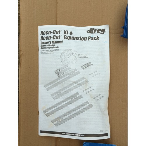 124 - Kreg Accu-Cut XL circular saw track guide system; accompanied by the Accu-Cut XL and Accu-Cut Expans... 