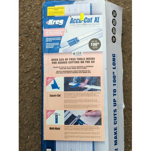 124 - Kreg Accu-Cut XL circular saw track guide system; accompanied by the Accu-Cut XL and Accu-Cut Expans... 