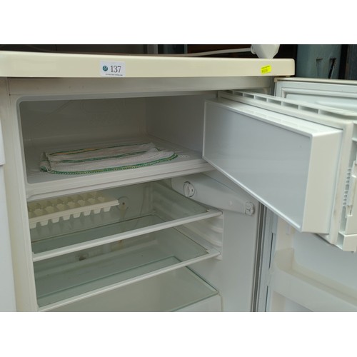 137 - Zanussi Electrolux under-counter larder refrigerator, model ZR 65/2 W; accompanied by instruction bo... 