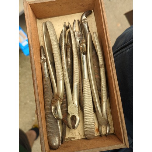 151 - A quantity of vintage dental extraction forceps and related instruments, various patterns with knurl... 
