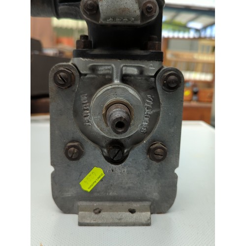 155 - Small air-cooled single-cylinder engine with finned cylinder head, side exhaust outlet, and twin-end... 