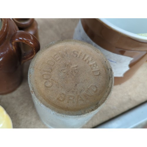 162 - A quantity of ceramic table and kitchen wares including brown-glazed stoneware jars and jugs, Denby ... 