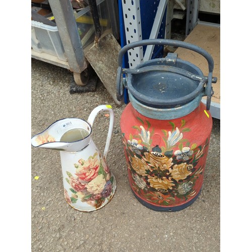 163 - Hand-painted floral milk churn with hinged lid and swing handle, together with an enamelled ewer.