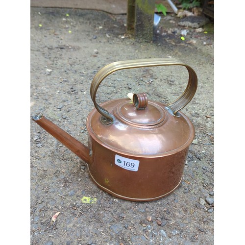 169 - Copper kettle, fitted with a brass handle.