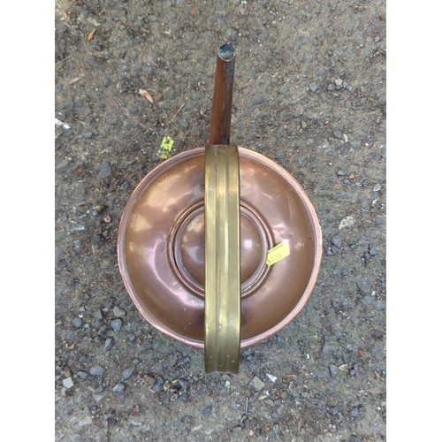 169 - Copper kettle, fitted with a brass handle.