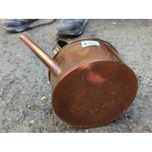 169 - Copper kettle, fitted with a brass handle.