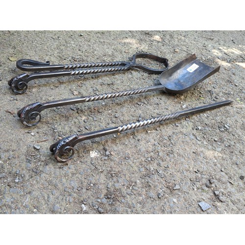 170 - A set of bespoke wrought-iron fireplace tools made by James Kendrew  comprising a poker, shovel and ... 