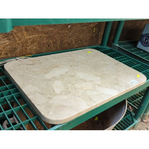 171 - Rectangular cream marble tabletop, the rounded corners with moulded edge; the polished surface displ... 
