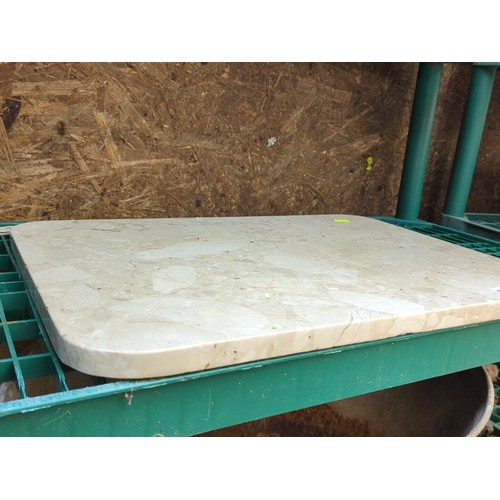 171 - Rectangular cream marble tabletop, the rounded corners with moulded edge; the polished surface displ... 