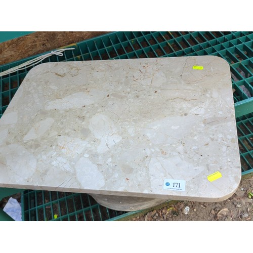 171 - Rectangular cream marble tabletop, the rounded corners with moulded edge; the polished surface displ... 