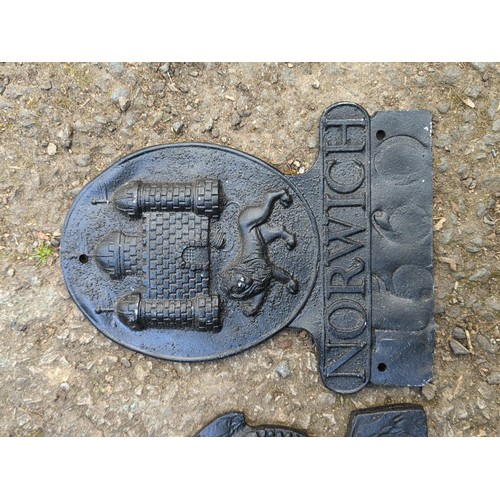 174 - A group of reproduction Norwich decorative plaques.